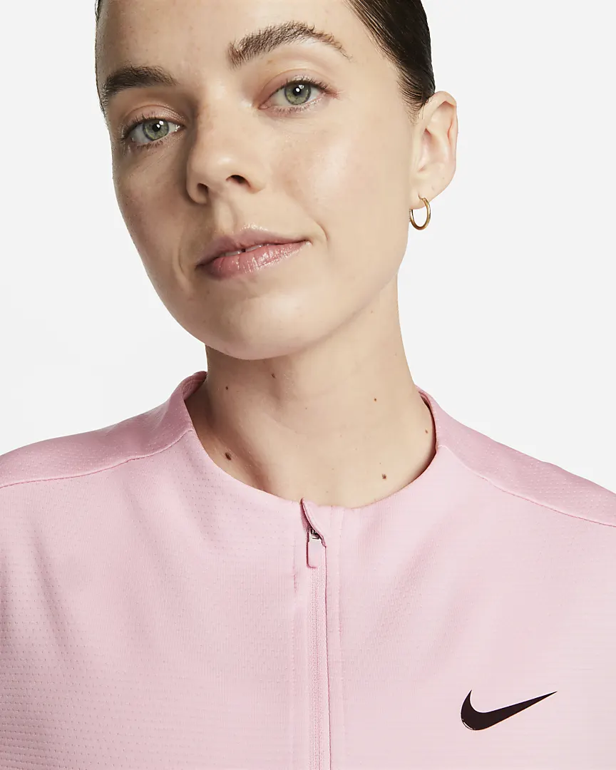 Nike | DX1491-690 | Dri-FIT UV Advantage Ladies 1/2-Zip Golf Top | Medium Soft Pink